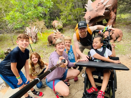 The Akey family visiting Dinosaur World.