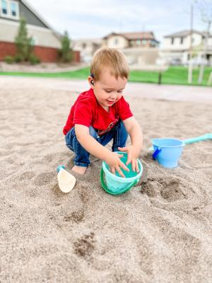 Cameron playing in sandbox
