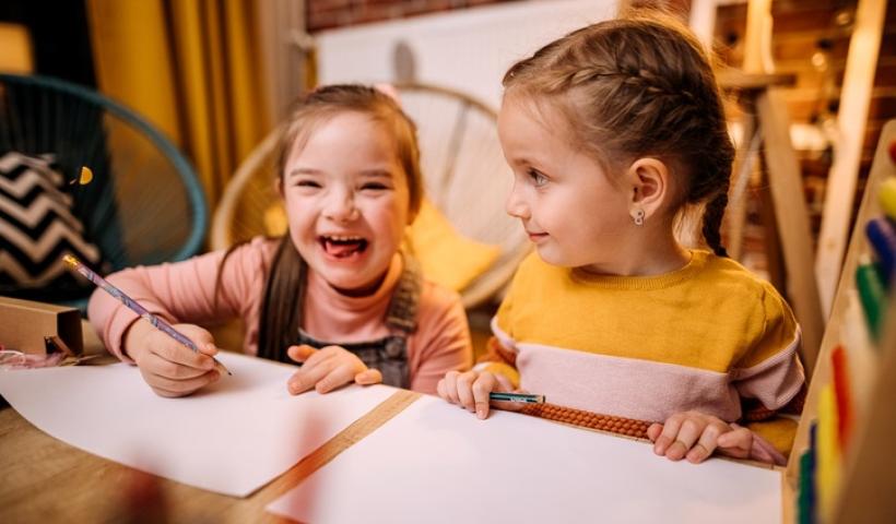 Children at table, laughing