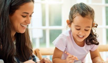 Mother and child drawing pictures