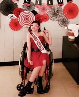 Teen in wheelchair, dressed for Homecoming