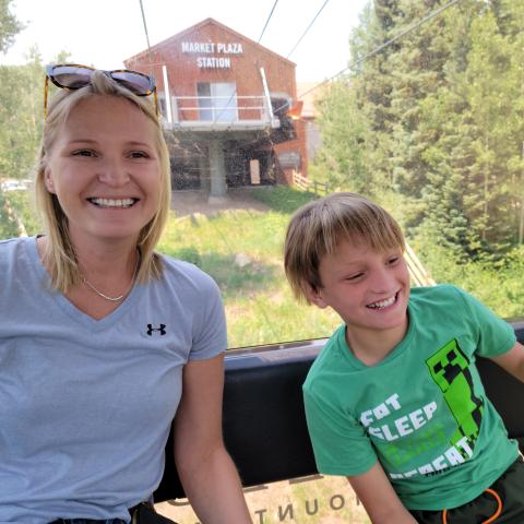 Mother and son on ski lift