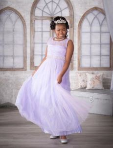 Young girl in white gown and tiara