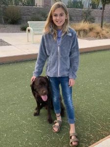 Girl and dog at park