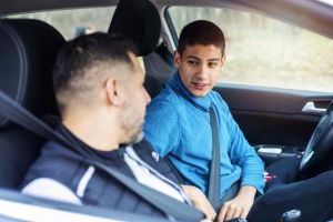 Teen driver with father in passenger seat
