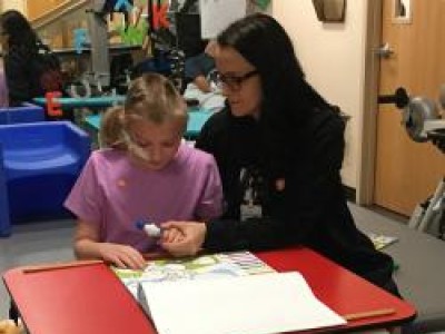 OT and child working together