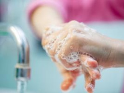 Close up of hands being washed