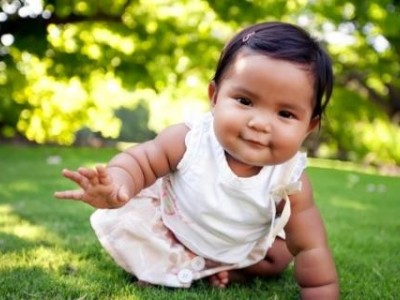 Baby crawling toward camera