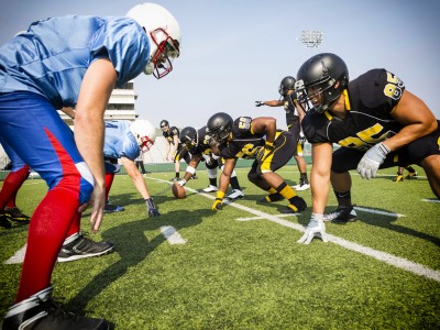 High school football teams playing game