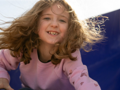 Girl in pink sweater