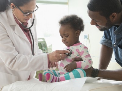 Baby with Doctor and parent