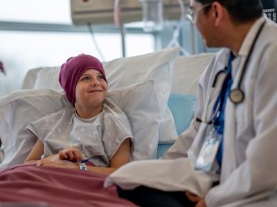 Doctor with child at bedside