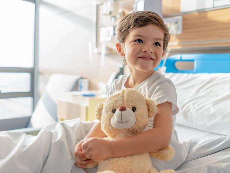 Boy in hospital bed