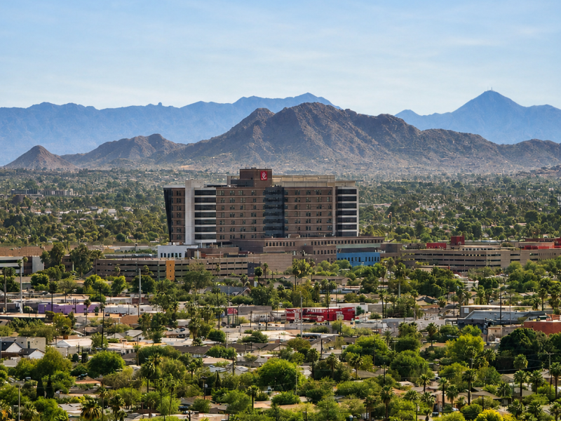Exterior of hospital with mountains behind