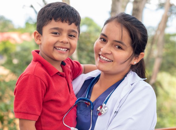 Smiling child and provider