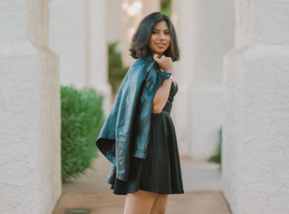 Teen posing, looking over her shoulder