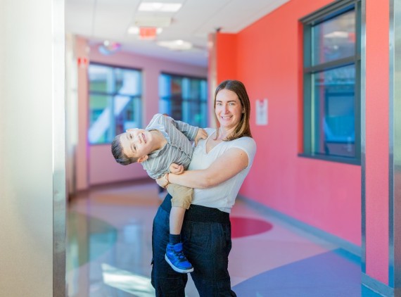 Boy in his mother's arms