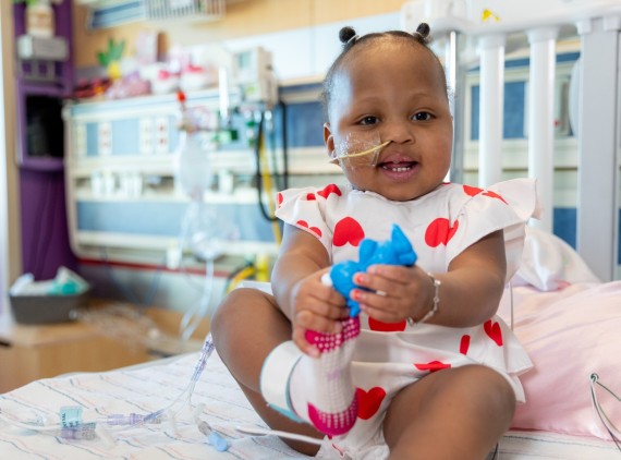 Toddler in hospital bed