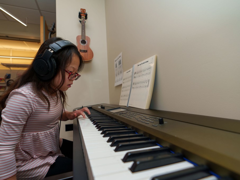 Girl playing the keyboard in The Zone