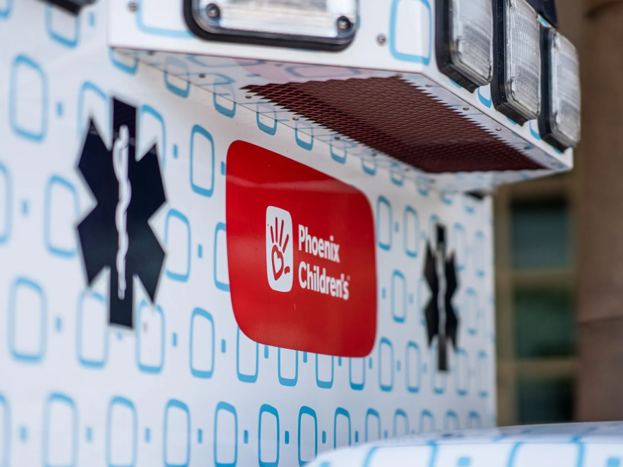 Closeup of ambulance with Phoenix Children's logo