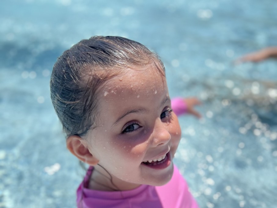 Young girl in swimming pool