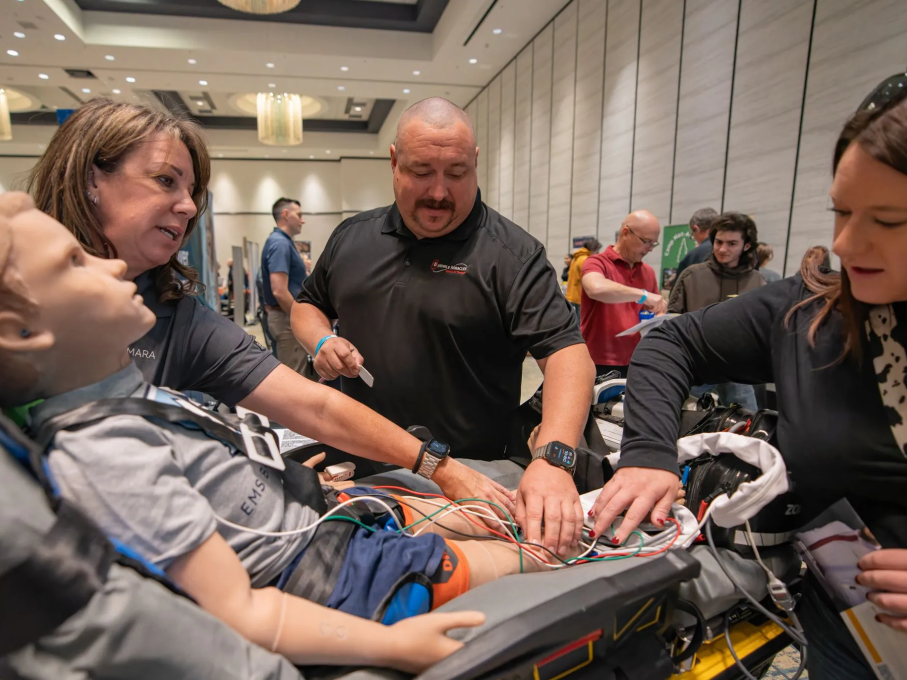 Conference attendees with EMS dummy