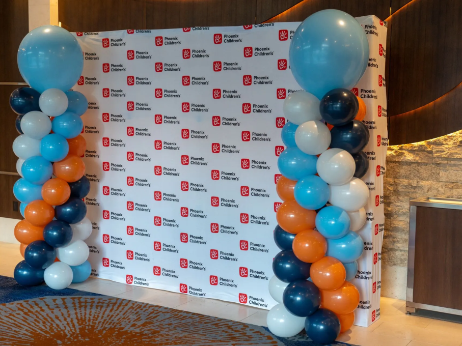 Phoenix Children's balloons and photo backdrop