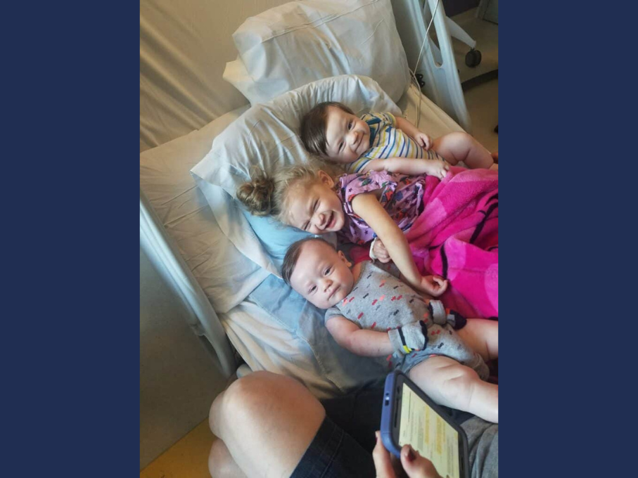 Toddler in hospital bed