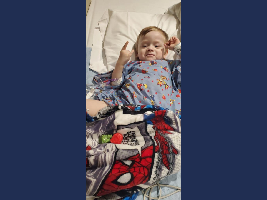 Toddler in hospital bed