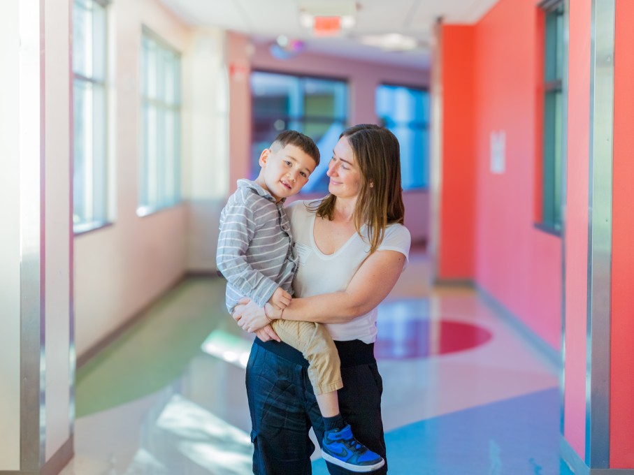 Boy in his mother's arms
