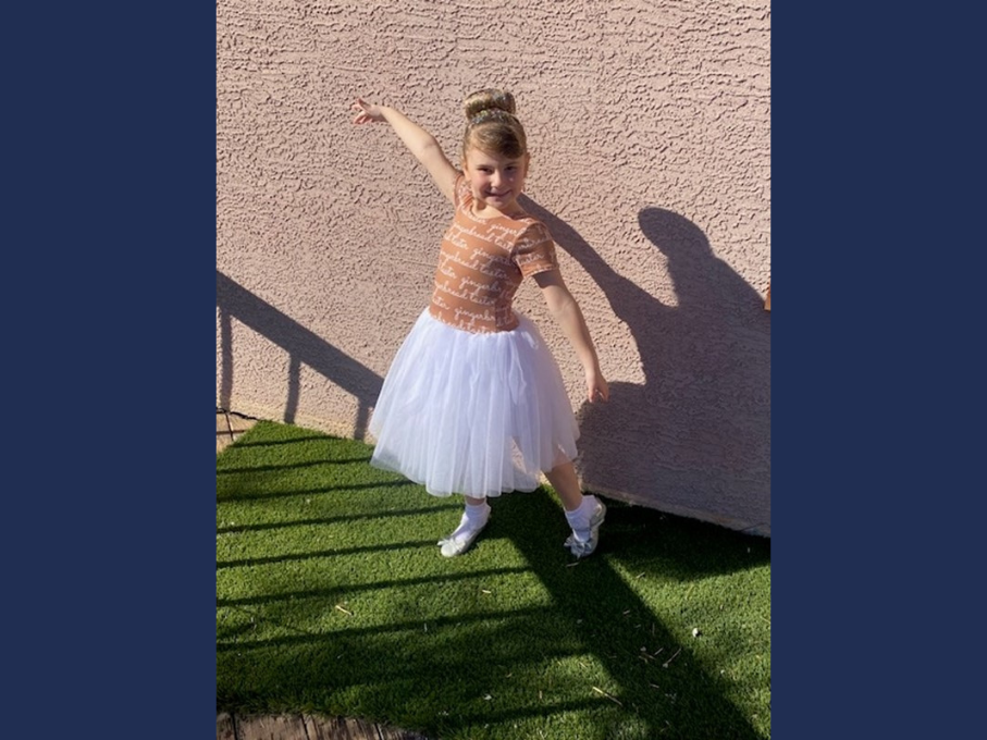 Girl in white ballet skirt