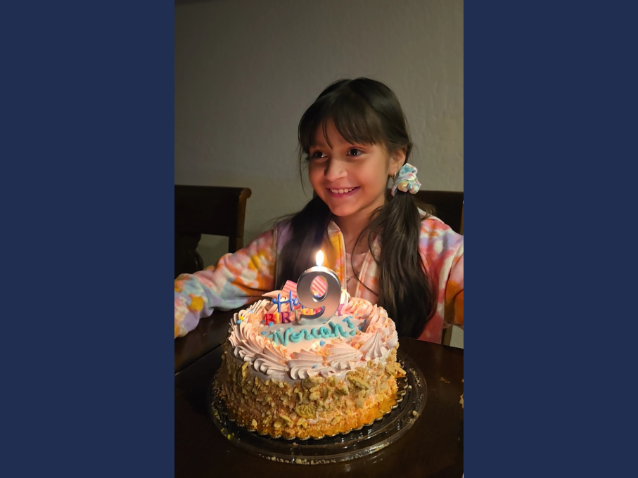 Girl with birthday cake