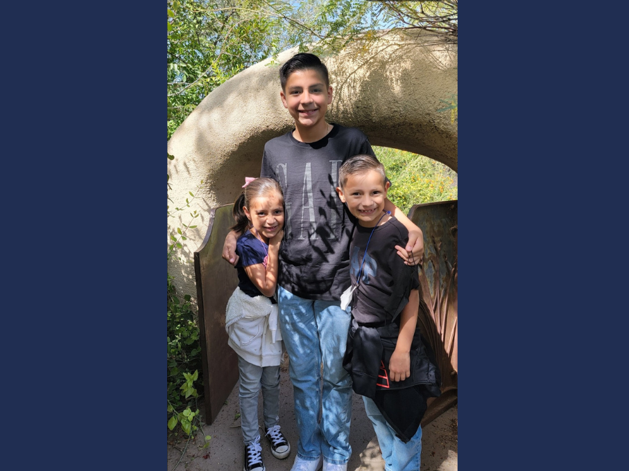 Siblings posing for photo