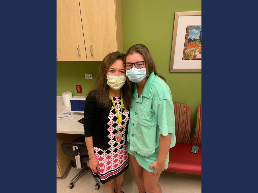 Masked patient and doctor