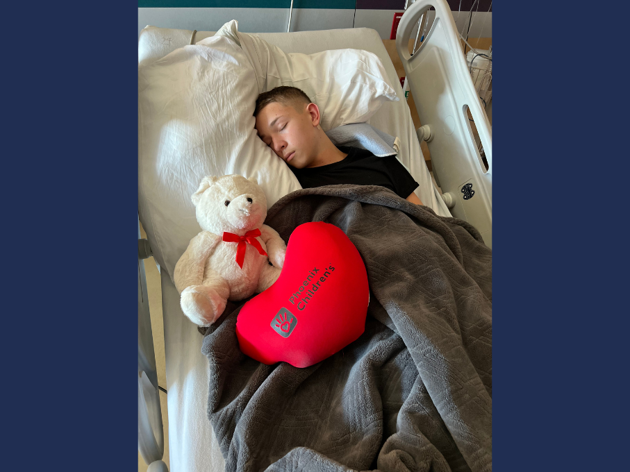 Teen boy in hospital bed