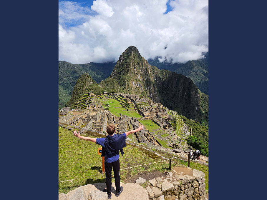 Teen boy looking at mountains