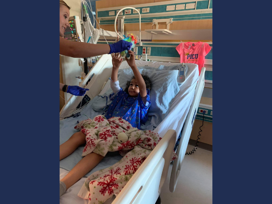 Child in hospital bed