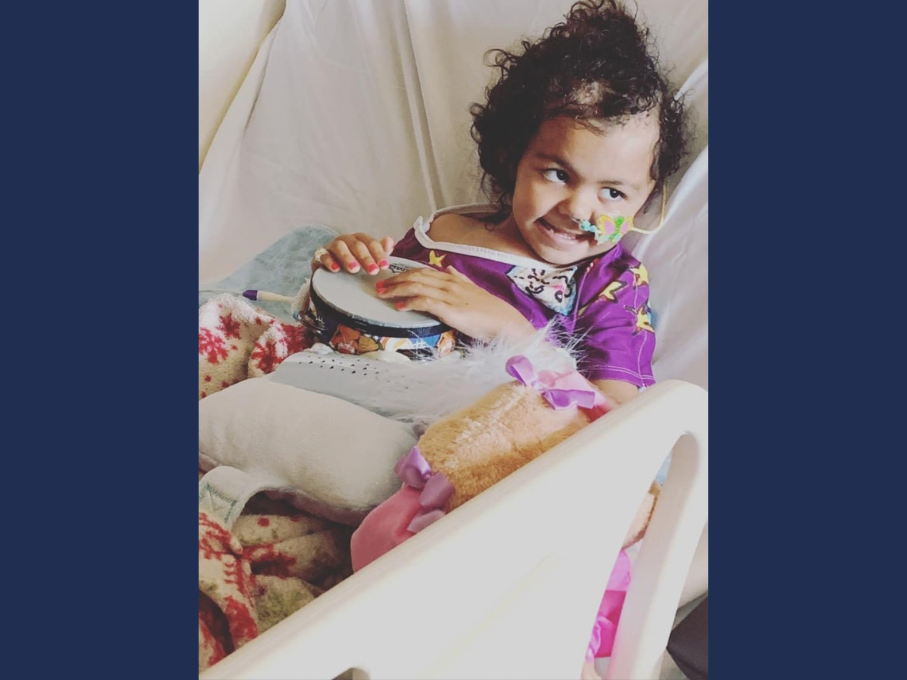 Toddler in hospital bed