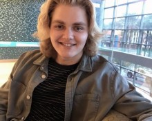 Teen sitting in hospital lobby