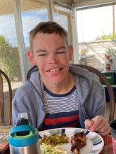 Teen smiling on back patio