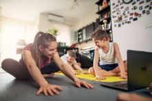 Mother and child doing yoga