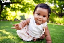 Baby crawling toward camera