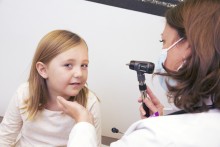 Girl getting her eyes checked