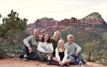 Family smiling in Arizona landscape