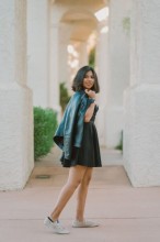 Teen posing, looking over her shoulder