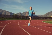 Girl running on track