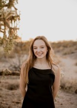Teen girl posing in desert