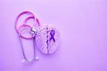 Image of brain, stethoscope and purple ribbon for Epilepsy Month