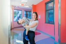 Boy in his mother's arms