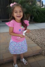 Smiling girl wearing pink